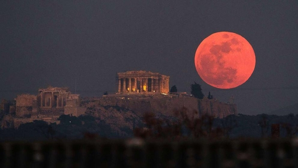 Blood moon above the Acropolis of Athens