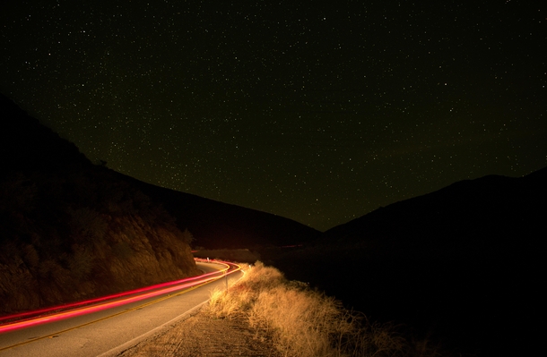Bouquet Canyon CA  - My first attempt at a starry landscape I thought the car passing by would ruin my exposure but I think it makes the picture