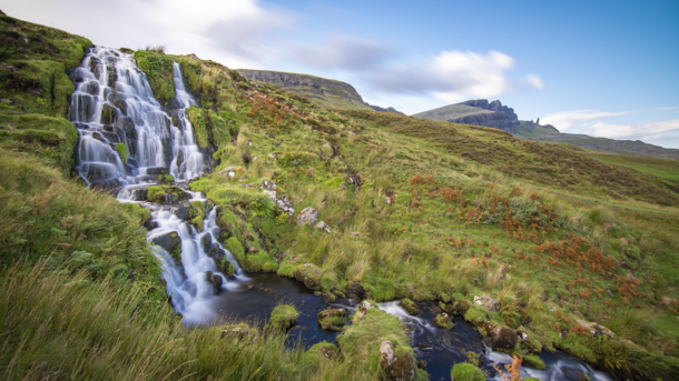 Brides Veil Falls Isle of Skye Scotland With the Old Man of Storr in the distance 