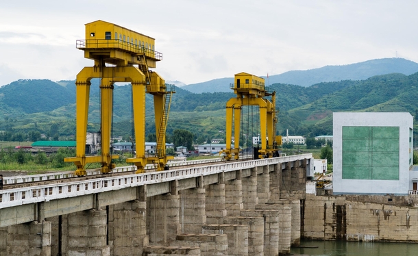 Bridge with cranes few hours north of Pyongyang North Korea 