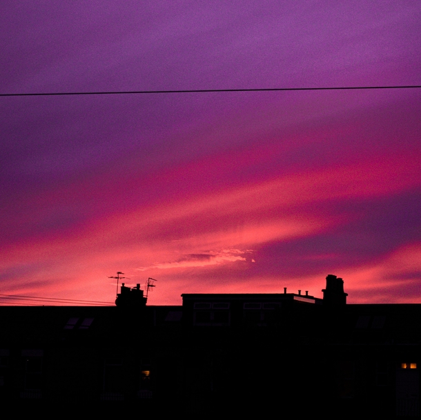 bright pink toned sunset over Musselburgh Scotland