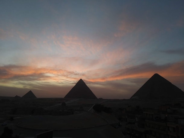 Cairo Egypt - Sun Setting over the Pyramids of Giza
