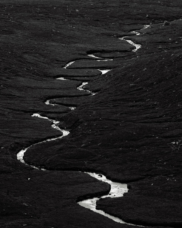 Came across what looked like a river of liquid silver snaking through the Scottish highlands UK 