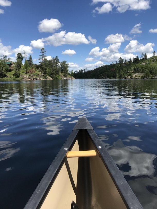 Canoeing on Saganaga Lake in the Boundary Waters MN USA 