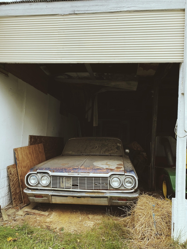 Classic Chevy rotting in a garage in Carlisle PA