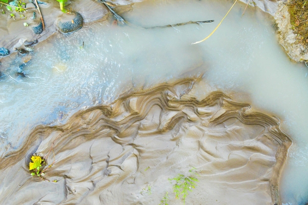 Closeup of the Carbon River Washington State showing sediment buildup on a sandbar 