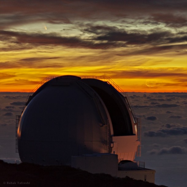 Clouds Comet and Crescent Moon seen from the William Herschel Telescope in the Canary Islands 