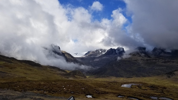 Clouds forming in the high Andes mountains Peru 