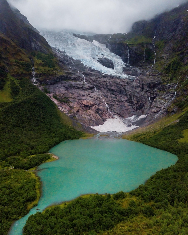 Clouds hugging Byabreen Glacier Norway 