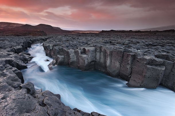 Cold River - a glacial river cutting through the Icelandic landscape near Hsafell in Borgafjrur  by rvar Atli orgeirsson