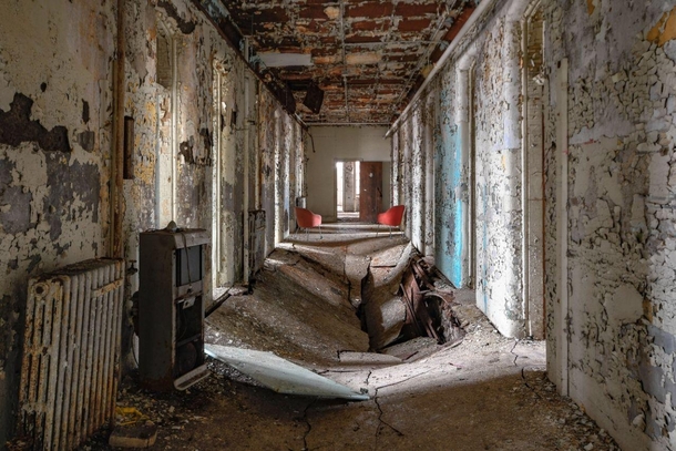 Collapsed floor in abandoned mental asylum