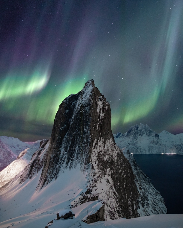 Colorful aurora over the fjords Troms Norway 