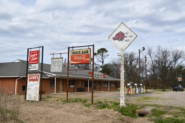 Cool signs at abandoned gas station amp cafe in rural Arkansas