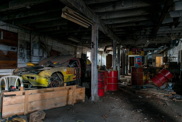 Crashed Race Car in Abandoned Garage