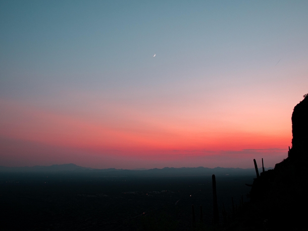 Crescent moon over the sunset Gates Pass AZ 