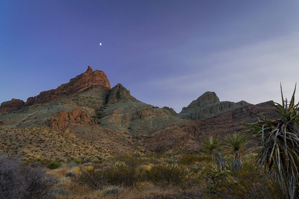 Crescent moon rising in the Southern Nevada desert - 