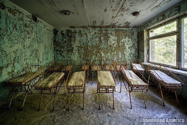 Cribs in abandoned hospital Chernobyl Exclusion Zone 