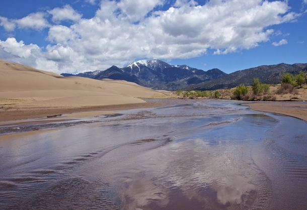 Crossing Medano Creek in Great Sand Dunes National Park CO 