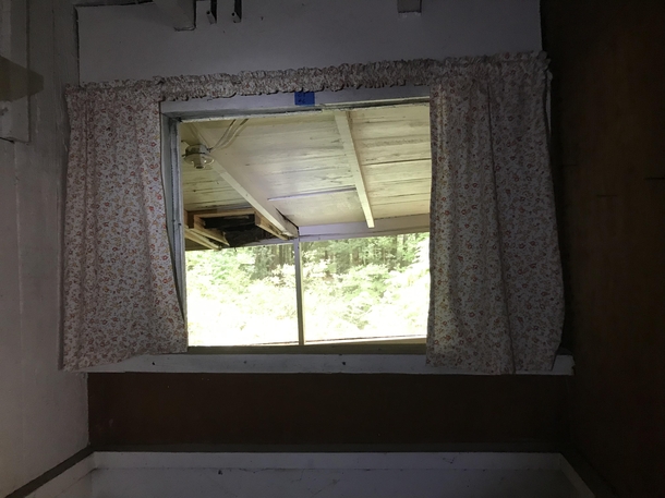 Curtains in a kitchen at an abandoned house 