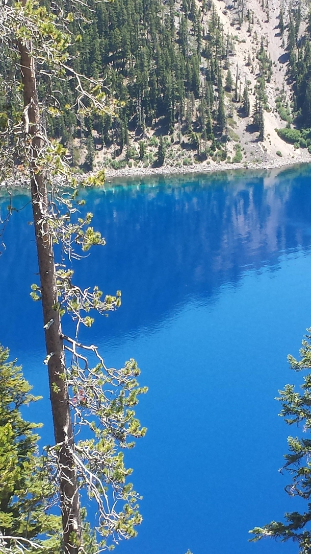 Deep clean water of Crater Lake Oregon on a sunny day 