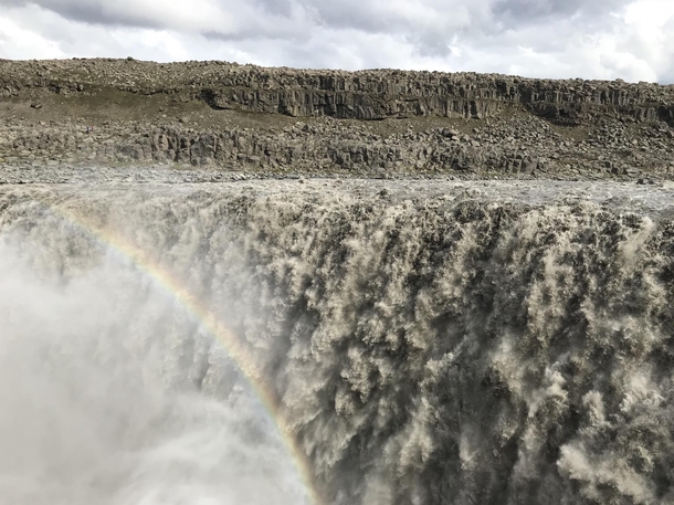 Dettifoss Iceland the most powerful waterfall in Europe the mist causing an almost permanent hazy rainbow 