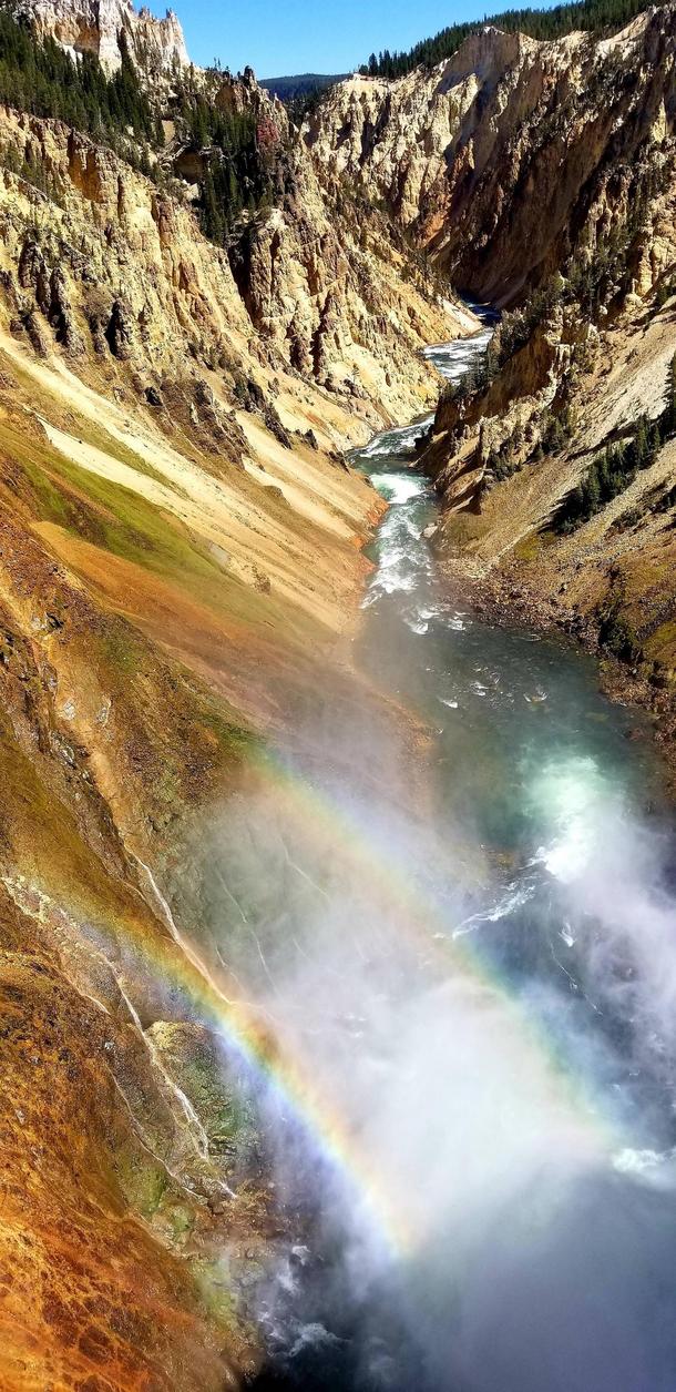 Double Rainbow up close near a roaring waterfall - Yellowstone National Park 