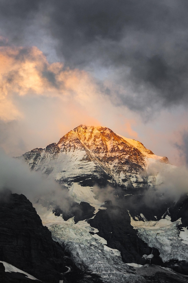 Dramatic clouds and a fiery sunset in the Bernese Alps 