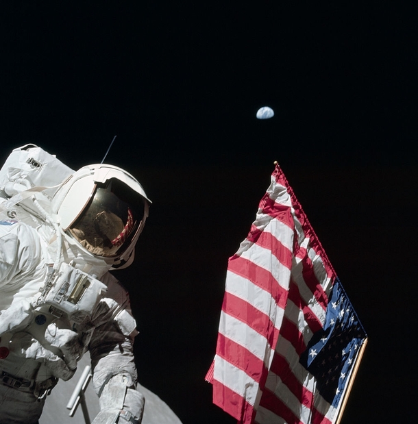 During the first EVA of Apollo  Eugene Cernan photographed Harrison Schmitt with the American flag and the Earth km away in the background 