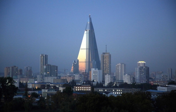Dusk settles over Pyongyang North Korea as the -story Ryugyong Hotel towers over residential apartments Under construction for nearly  years later it has become a major Pyongyang landmark but has never been used as a hotel as it was intended Wong Maye-E 