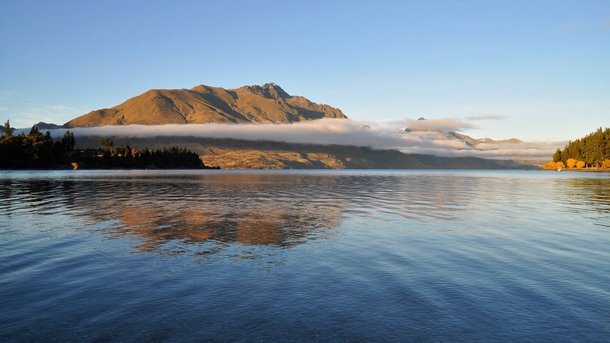 Early morning autumn on the banks of Lake Wakatipu Queenstown New Zealand First post here