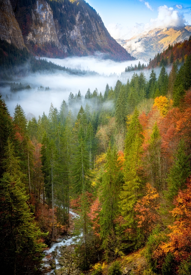 Early morning mists filling the Valle dAulps Haute Savoie France 