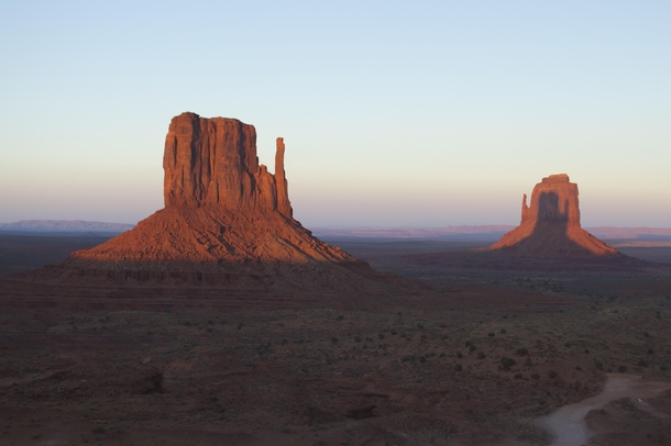 East-Mitten Butte casting its shadow on the West-Mitten Butte at Monument Valley AZ    OC