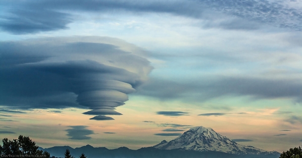 Eerie lenticular clouds over Mt Rainier Washington  photo by Dan Frechette