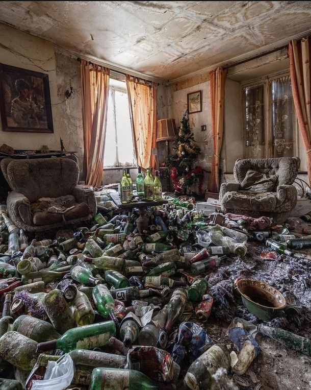 Empty bottles everywhere yet this living room seems parched of hope