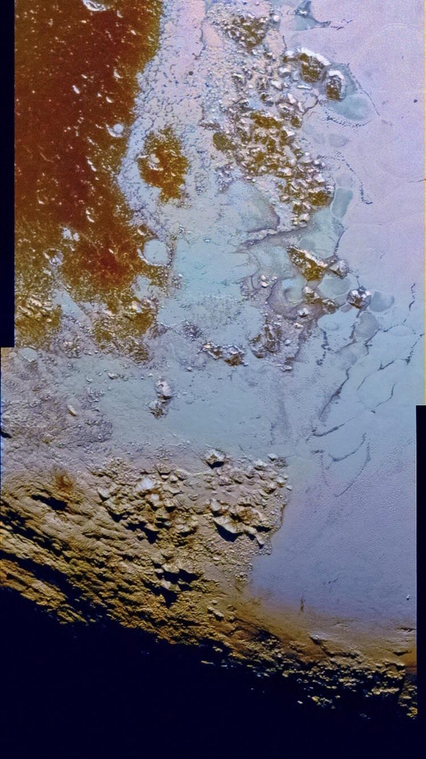 Enhanced color image of Plutos Sputnik Planum with Wright Mons lower left