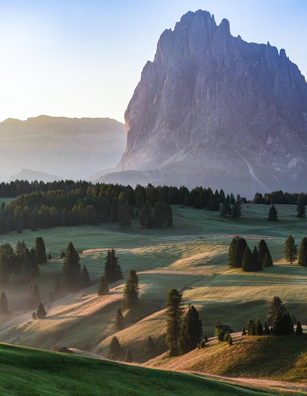 First light hitting the valley of Alpe di Siusi in the Dolomites Italy 