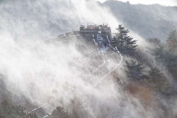 First snow over Beijing yesterday Great Wall at MuTianYu The wind blows the snow from the trees