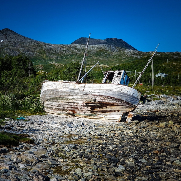 Fishing Boat Left To The Elements On An Island in Troms Norway 