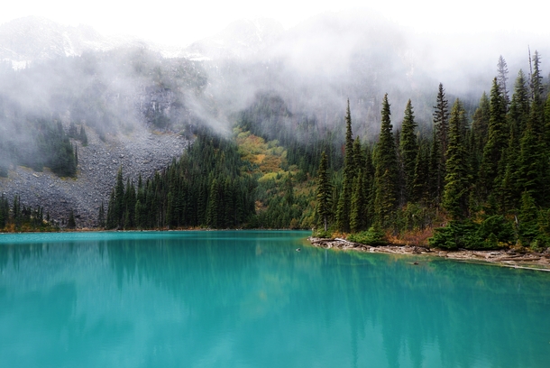 Fog over middle lake Joffre Lakes Provincial Park BC Canada 
