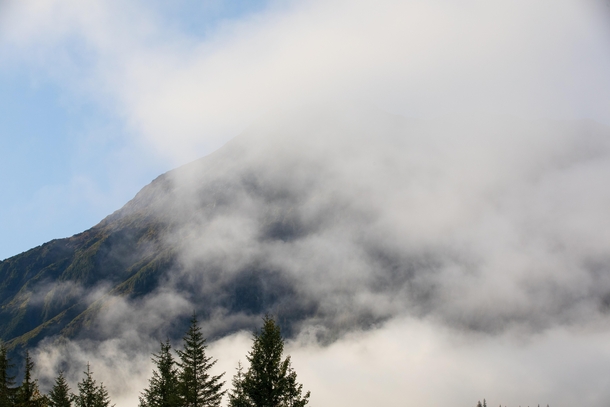 Fog over mountain ranges in Mendenhaven Alaska 
