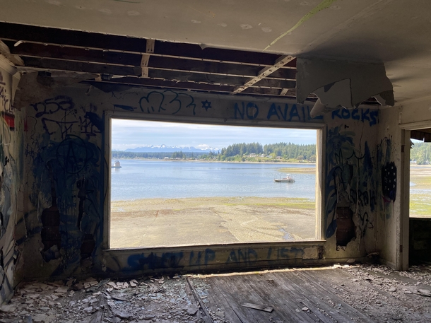Found an old abandoned beach house in the Puget Sound in Washington State This is looming towards the Olympic Mountains