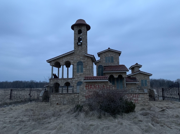 Found this place in Garrett Indiana Looks like it was supposed to be a gated community or something Everything looks pretty new Other than all the graffiti and beer cans