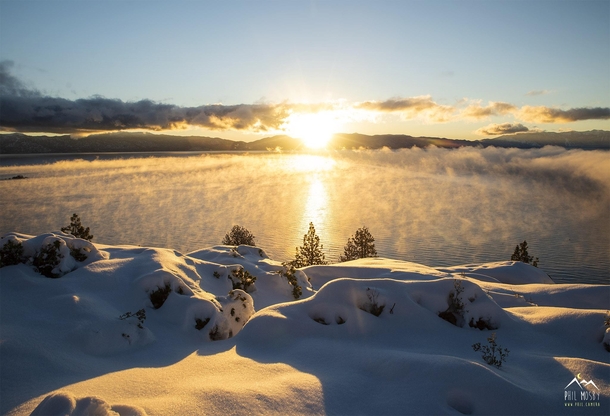 fresh snow and mist on the cold water Lake Tahoe CA US 