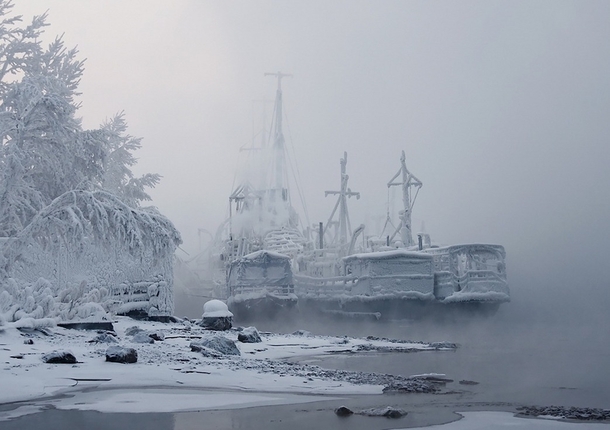 Frost-covered boats on the Yenisei River Siberia  Photo by Marina Fomin