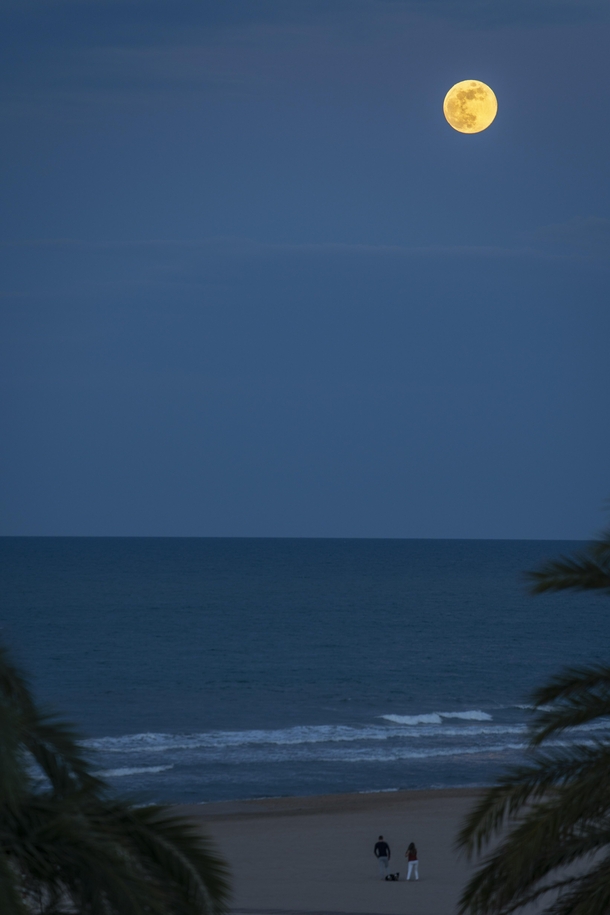 Full moon rising over Gandia Beach Spain