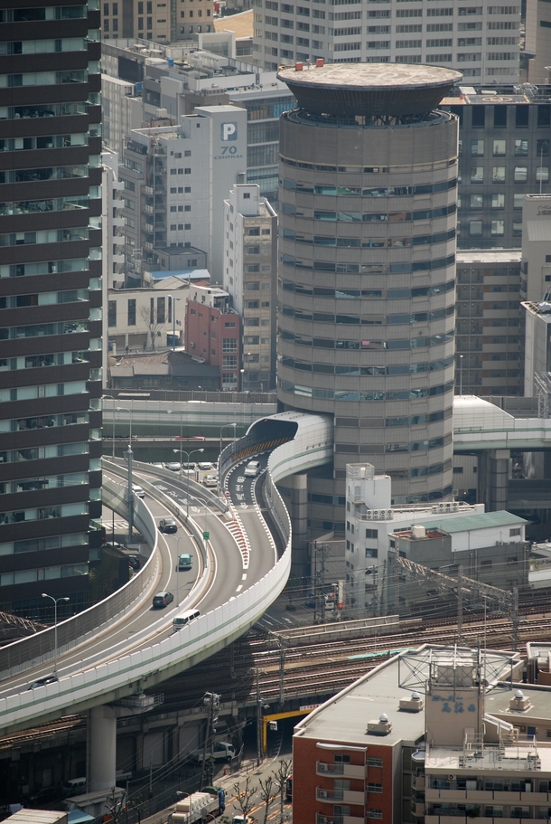 Gate Tower Building With a Highway Through it Osaka Japan 