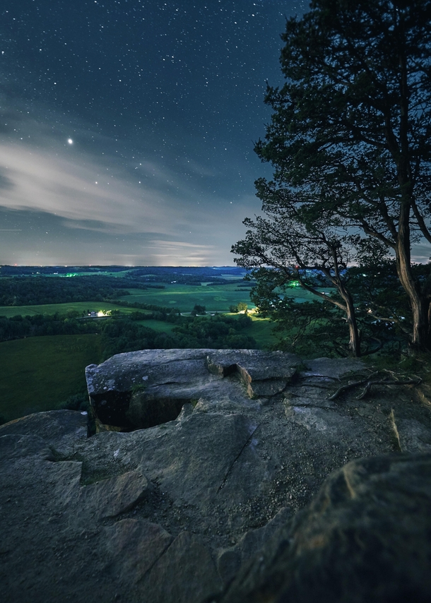 Giving way to night and fading away into stardust atop Gibraltar Rock in southern Wisconsin 