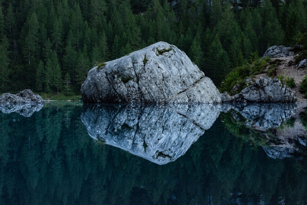 Glass-like reflections in Lago di Sorapis in the Dolomites 