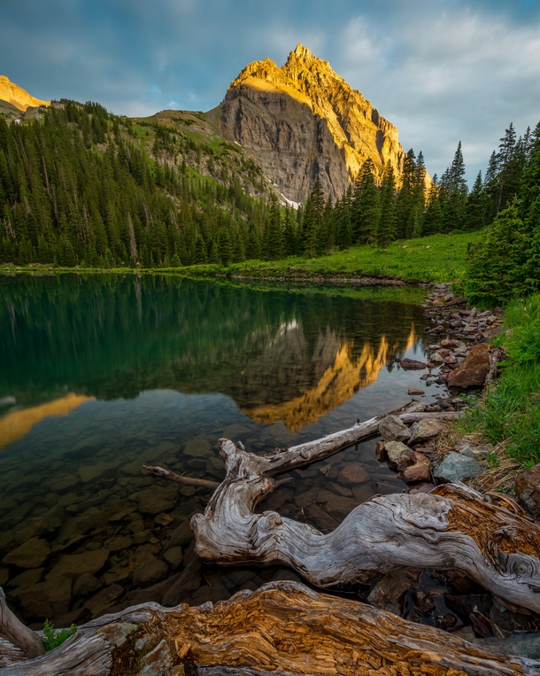Golden summer sunrise at Blue Lakes in the Mt Sneffels Wilderness Ouray County Colorado OC x