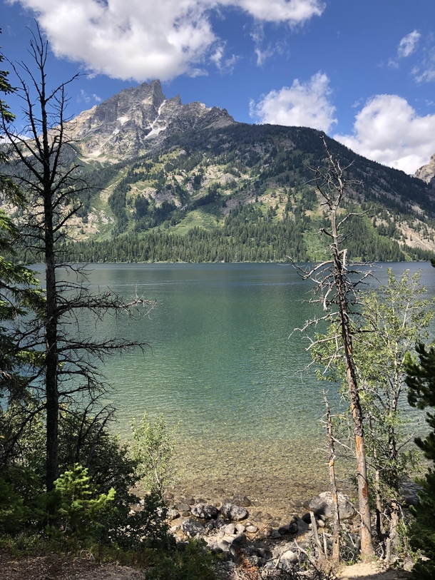 Got this shot of Jenny Lake and the Teton Mountains while exploring Grand Teton National Park in Wyoming Such a beautiful place 